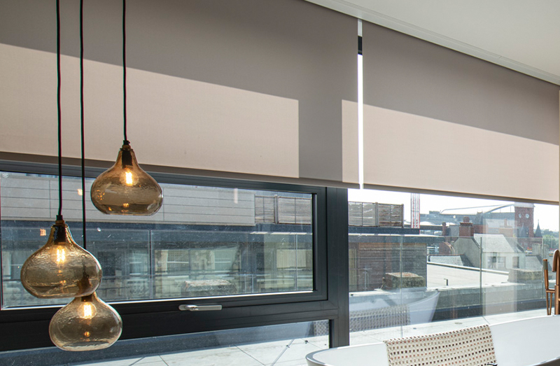 Roller blinds in a garden room