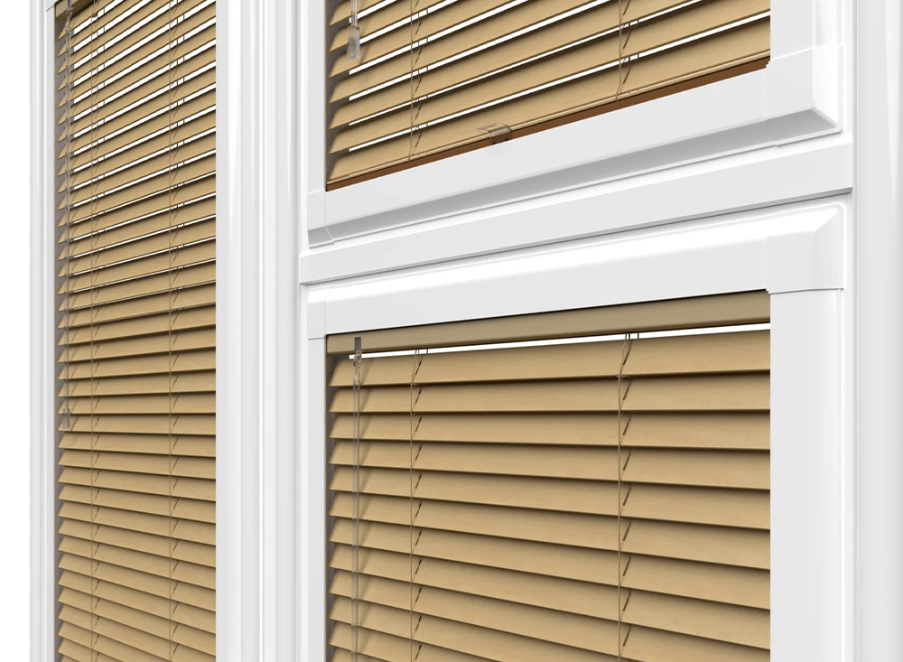 Decorquip cream Perfect Fit Venetian blinds fitted within white window frames
